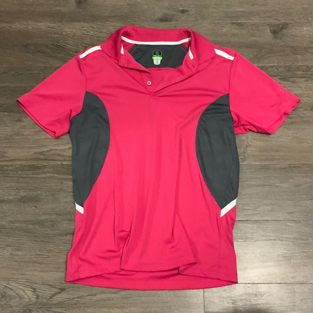Pro series golf shirt, pink in color, size medium